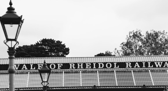 a black and white image of the 'Vale of Rheidol Railway' station's roof