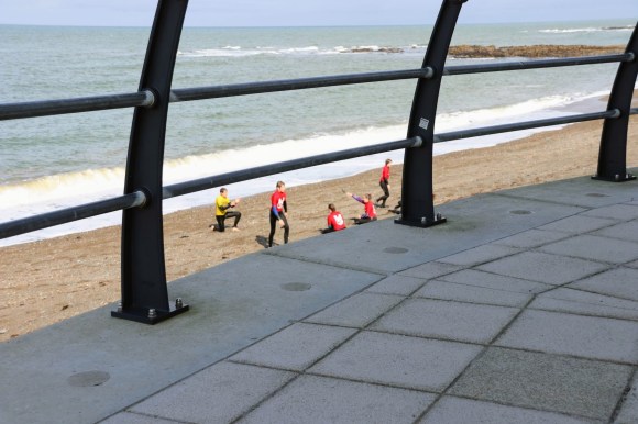 members of the Aberystwyth Seal Life Saving Club practicing on beach