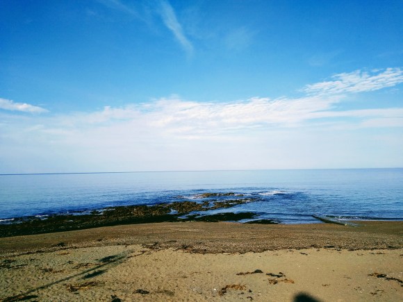 a sea view over Bath House rocks on Aberystwyth Beach's north shore