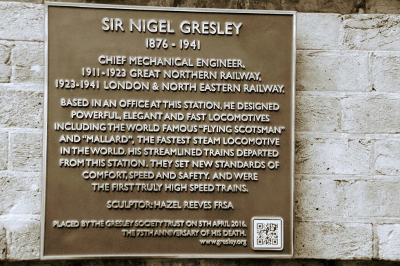 a bronze plaque associated with the statue of Sir Nigel Gresley