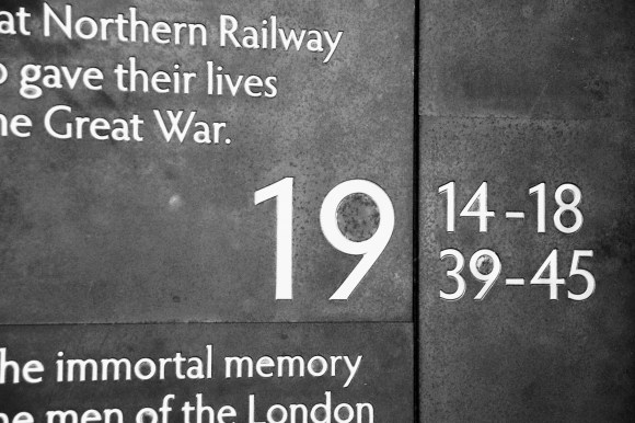 a tight shot of part of the war memorial. This pasrt dipslaying, in themain, 1914-18 and 1939-45 and the words 'Northern Railway' and 'immortal memory'