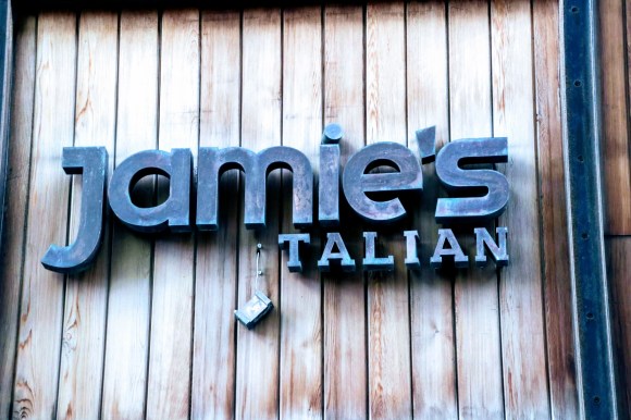 a sign outside the now closed 'Jamie's Italian' restaurant near John Lewis at Westfield. The 'I' of  Italian is hanging by a thread