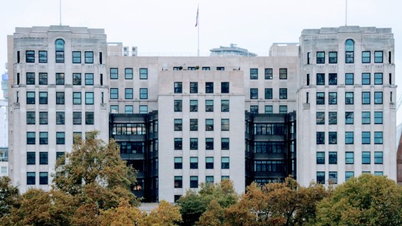 A coloour view of The Adelphi building taken from over the river. Autumnal trees in the foreground offer some foreground distraction to this 13 storey  'E' shaped  building in Portland Stone
